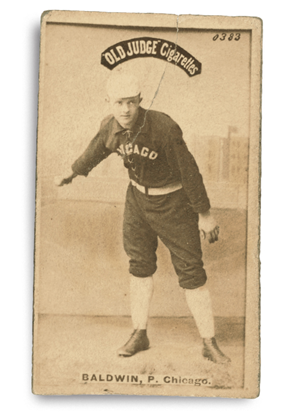 A baseball player holding an umbrella